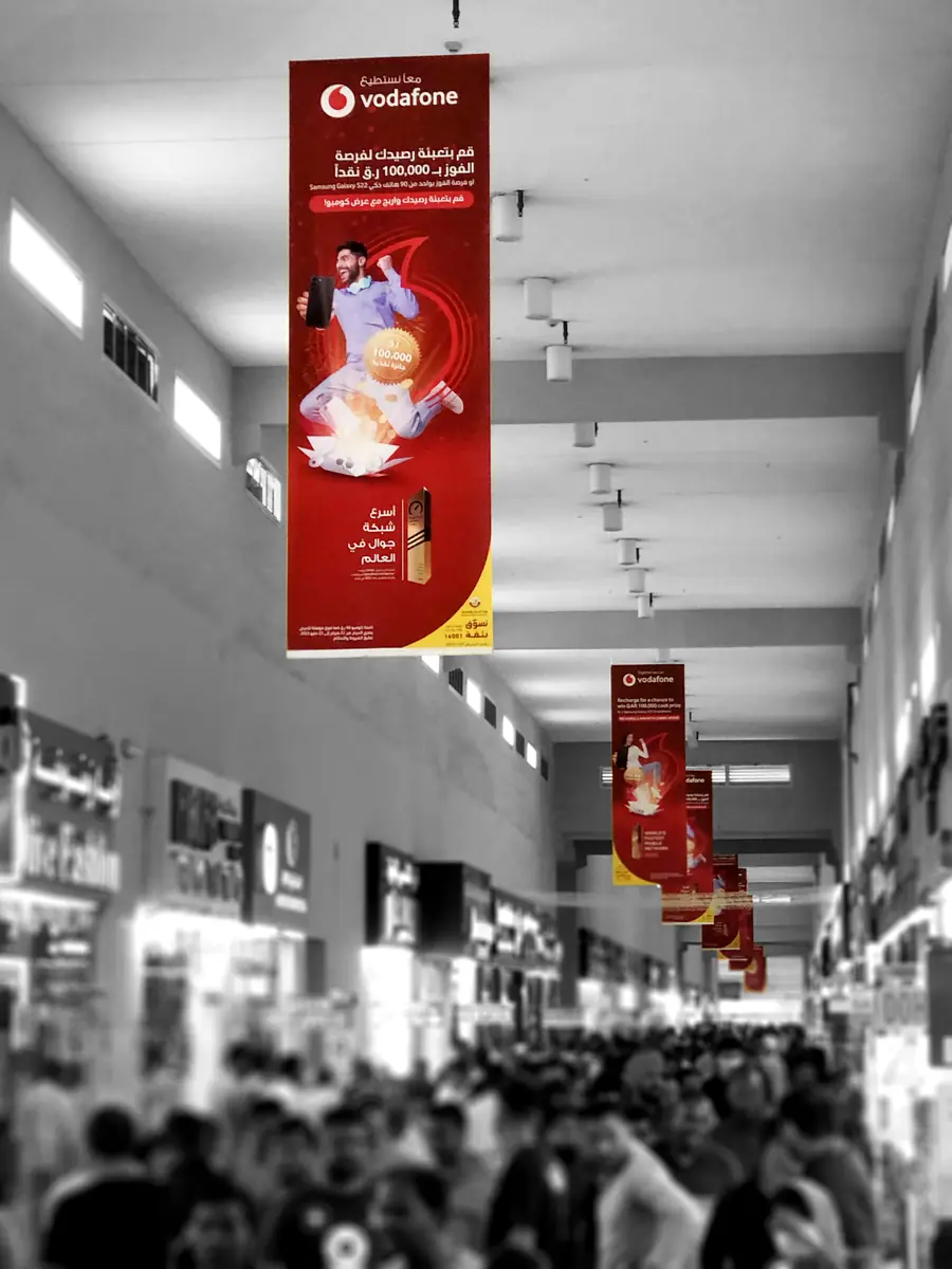 Hanging banners inside Plaza Mall