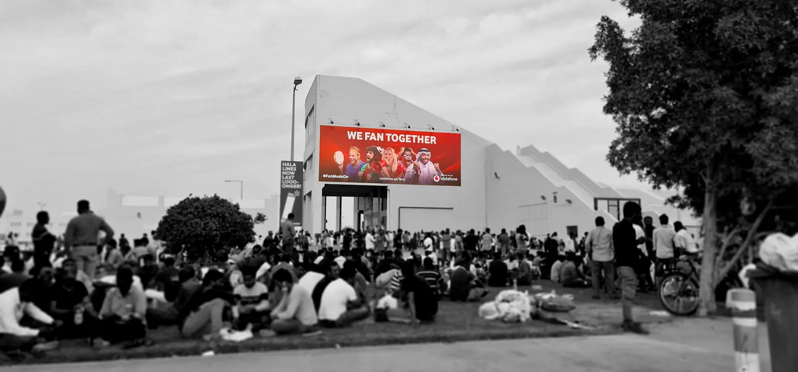 Wall Wrap A billboard above crowds at Asian Town